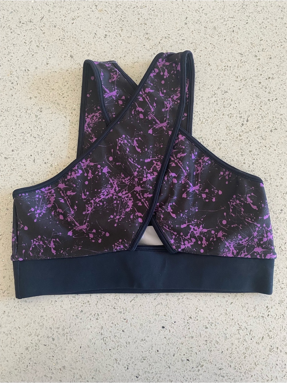HIPKINI Cross-Back Active Sports Bra in Black with Purple Splatter